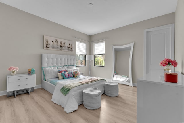 bedroom featuring light hardwood / wood-style floors