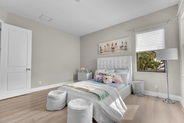 bedroom featuring light hardwood / wood-style floors