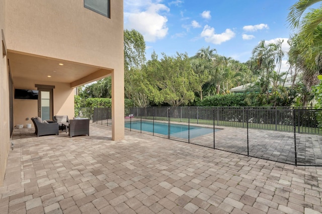 view of swimming pool featuring a patio