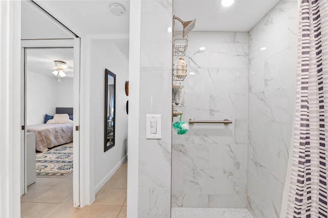 bathroom featuring tile patterned flooring, curtained shower, and ceiling fan