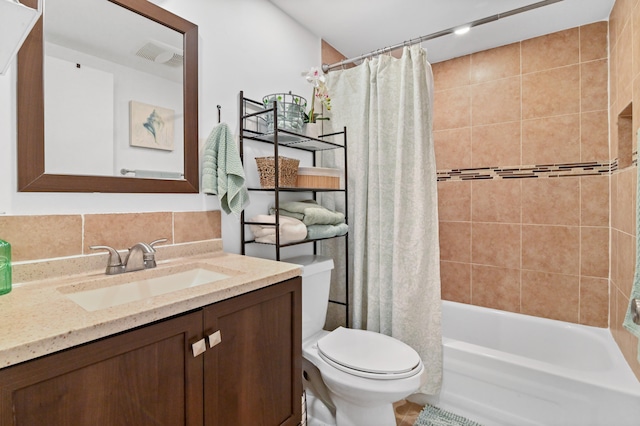 full bathroom with tile patterned flooring, tasteful backsplash, toilet, vanity, and shower / tub combo with curtain