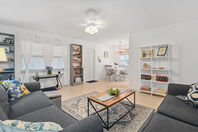 389 Capri I, Delray Beach, FL 33484 - living room featuring a notable chandelier