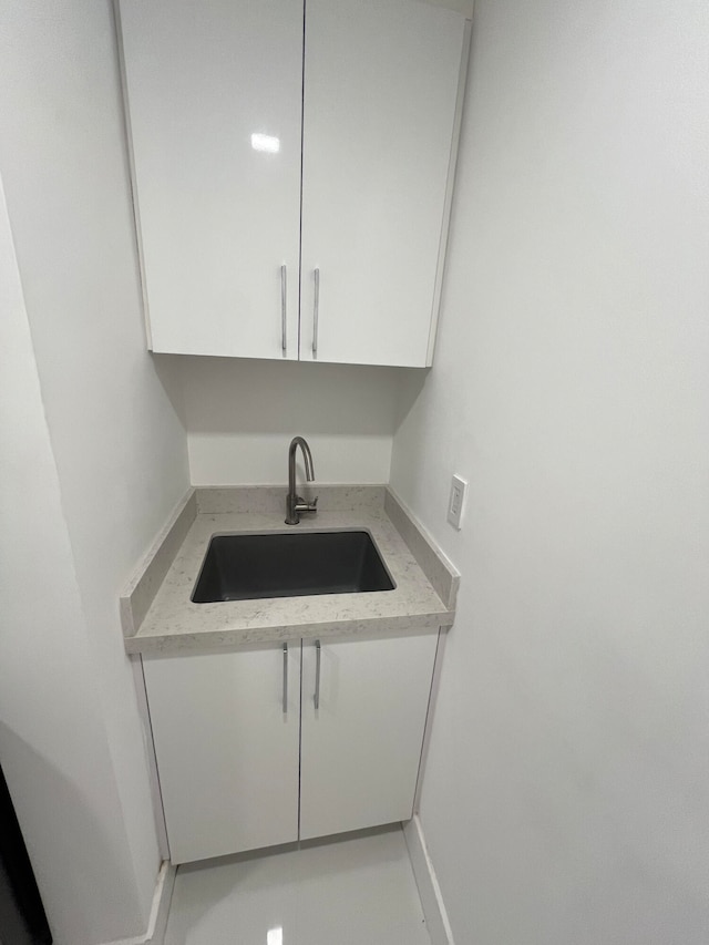 laundry area with sink