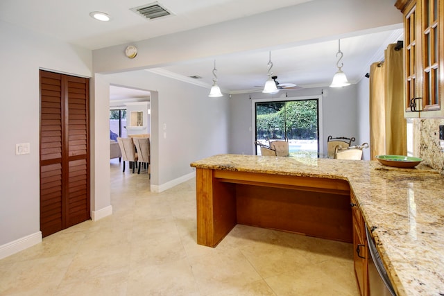 kitchen featuring decorative light fixtures, ceiling fan, a healthy amount of sunlight, light stone counters, and light tile patterned floors