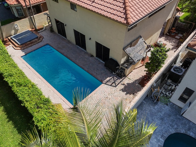 view of pool with a patio area