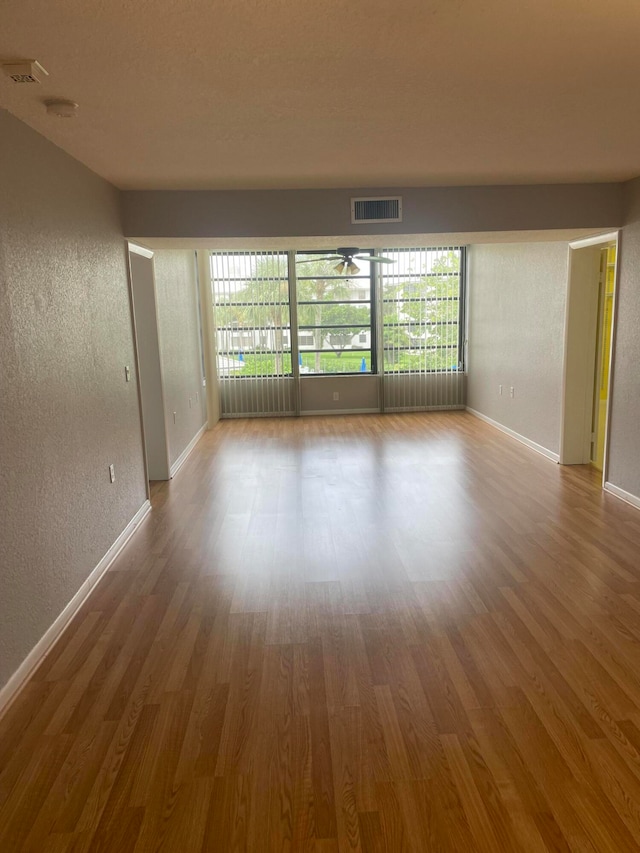 bathroom featuring vanity and hardwood / wood-style floors