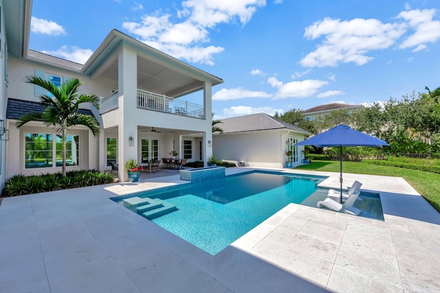 view of pool featuring a patio and ceiling fan