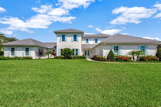 view of front of house with a front lawn