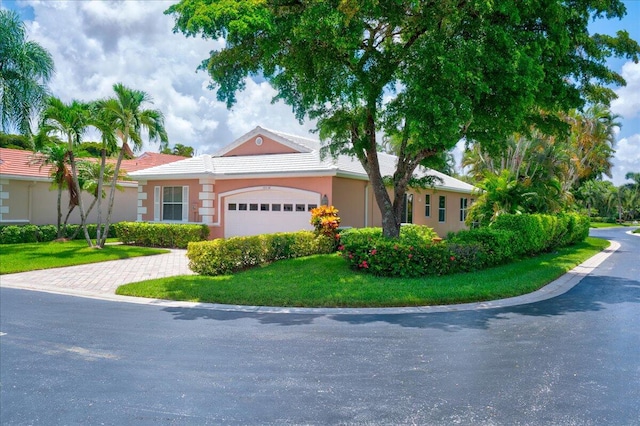 ranch-style home with a garage