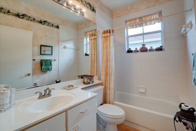 full bathroom with tile patterned flooring, shower / bath combo, toilet, and vanity