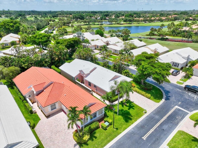 drone / aerial view with a water view