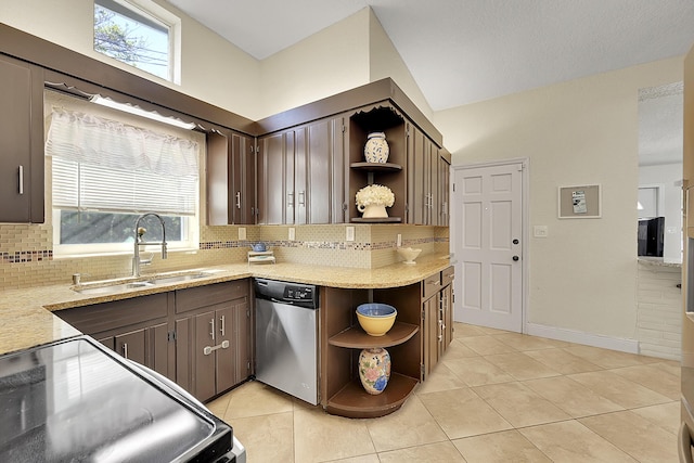 kitchen with a sink, range, open shelves, and dishwasher