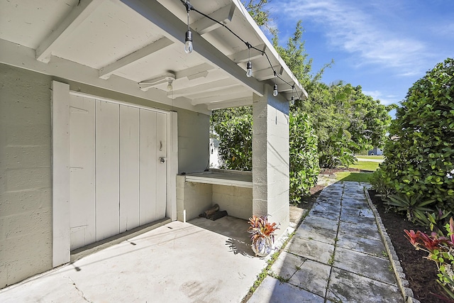 doorway to property featuring a patio area