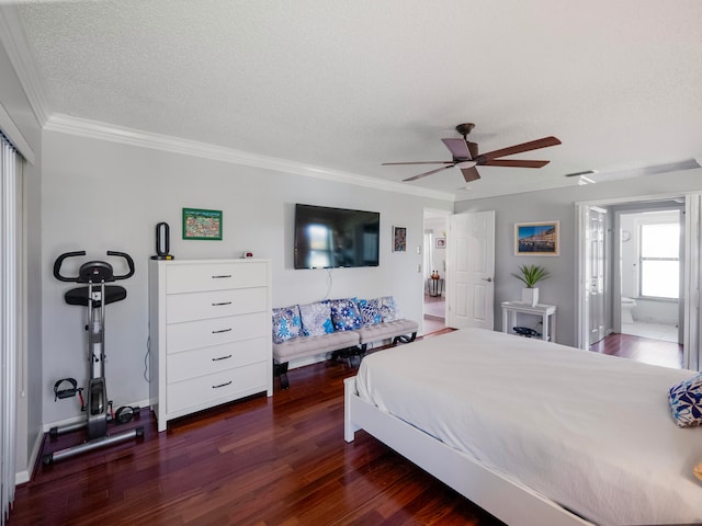 bedroom with a textured ceiling, ceiling fan, crown molding, and dark wood-type flooring