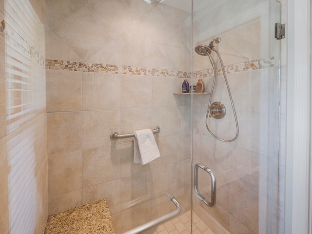 bathroom with an enclosed shower