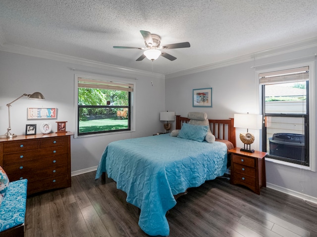 bedroom featuring multiple windows, ceiling fan, crown molding, and dark wood-type flooring