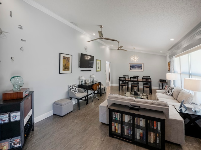 living room with ornamental molding, ceiling fan with notable chandelier, and a textured ceiling