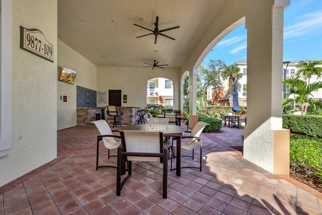 view of patio / terrace featuring ceiling fan