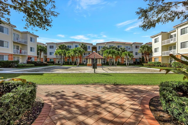 9873 Baywinds Dr Unit 5302, West Palm Beach, FL 33411 - view of home's community with a residential view and a lawn
