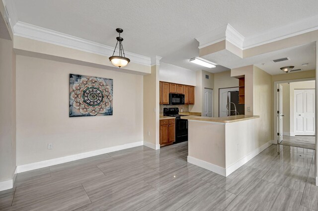 kitchen with backsplash, pendant lighting, light tile patterned floors, kitchen peninsula, and black appliances