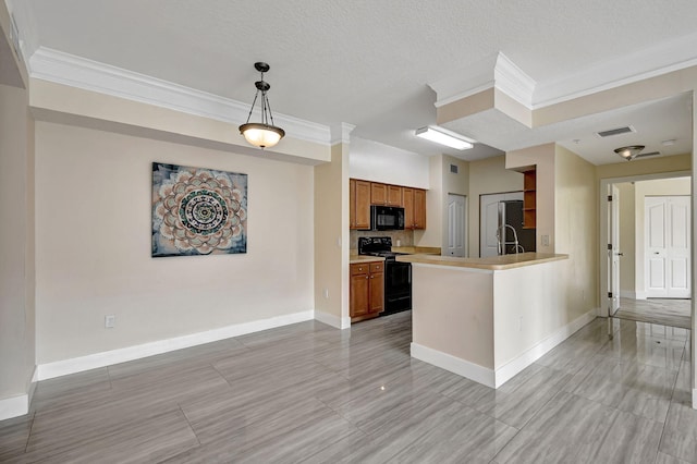 9873 Baywinds Dr Unit 5302, West Palm Beach, FL 33411 - kitchen with black appliances, crown molding, brown cabinetry, light countertops, and baseboards