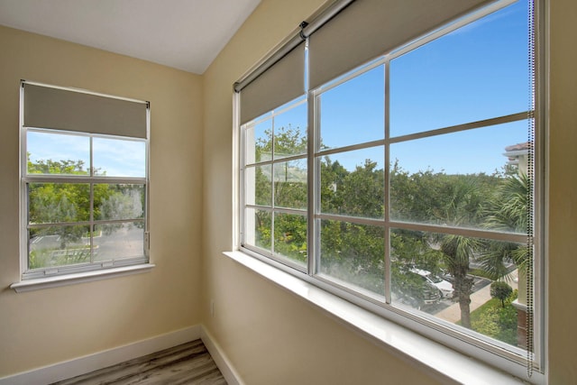 spare room featuring hardwood / wood-style flooring