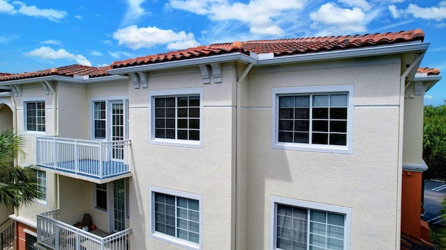 view of property exterior with a balcony