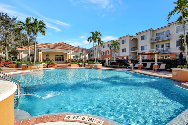 view of pool featuring pool water feature