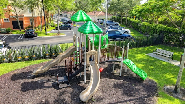 view of jungle gym featuring a yard