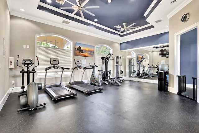 9873 Baywinds Dr Unit 5302, West Palm Beach, FL 33411 - workout area with a tray ceiling, ceiling fan, crown molding, and baseboards