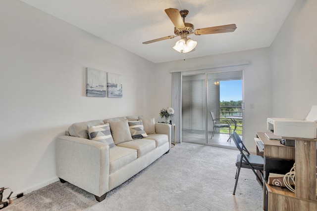 living room with light carpet and ceiling fan