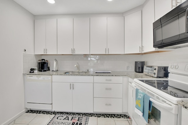 kitchen with sink, white cabinetry, and white appliances