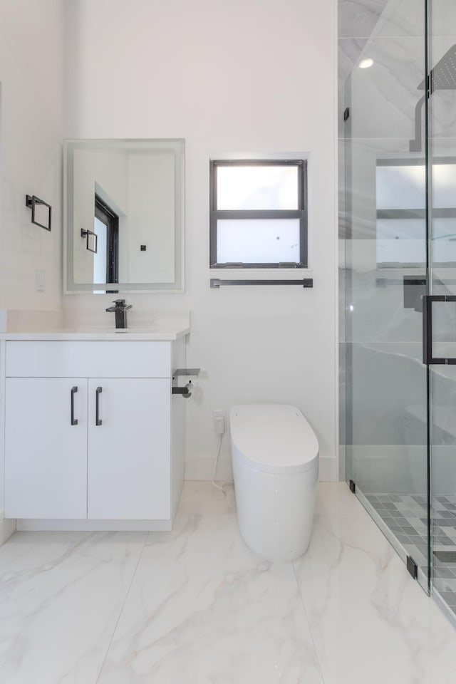 bathroom with toilet, vanity, baseboards, marble finish floor, and a stall shower