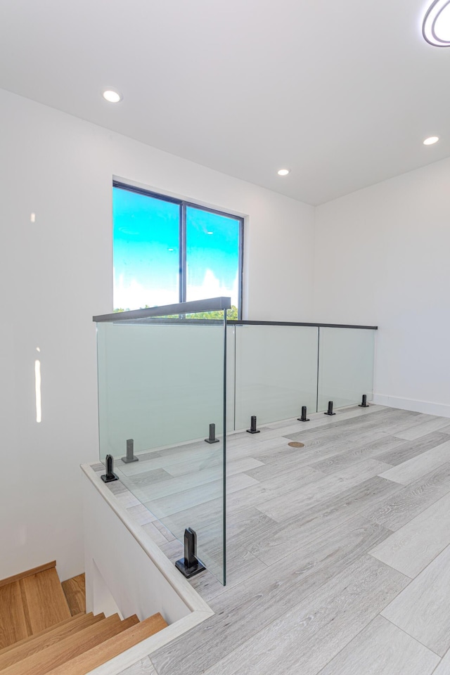 interior space featuring light wood finished floors and recessed lighting