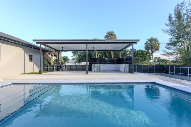 view of pool with a fenced in pool, a patio area, and a fenced backyard