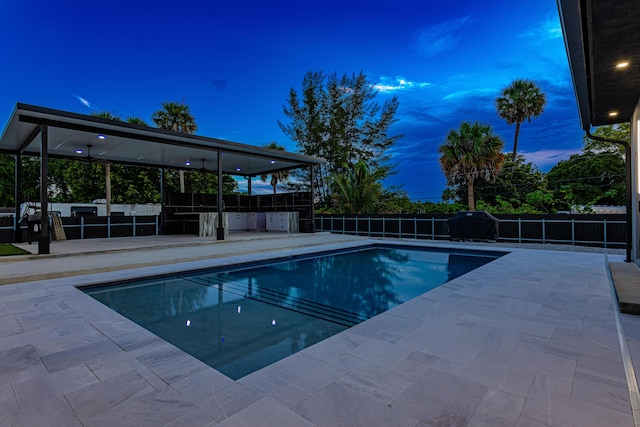 view of pool featuring fence, a fenced in pool, and a patio