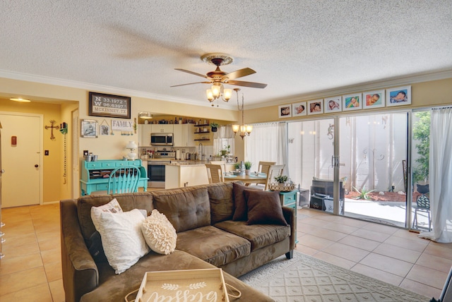 tiled living room with ceiling fan with notable chandelier, ornamental molding, and a textured ceiling