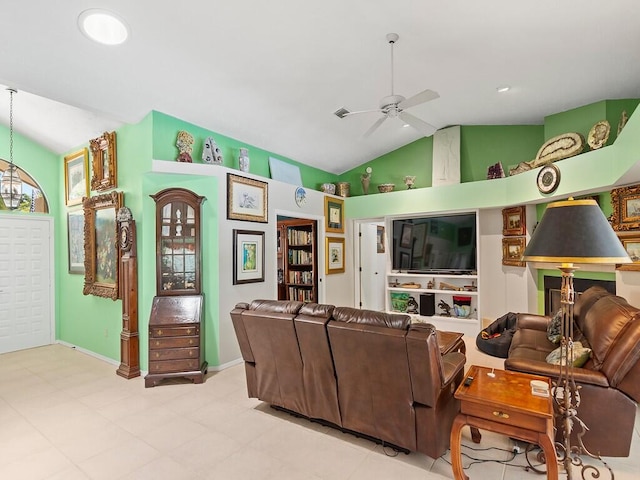 tiled living room featuring lofted ceiling and ceiling fan