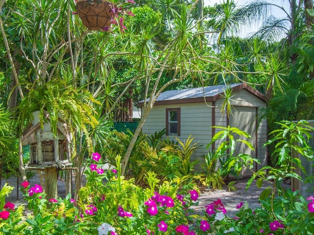 exterior space with a storage shed