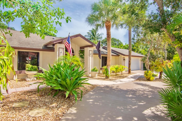 view of front of home with a garage