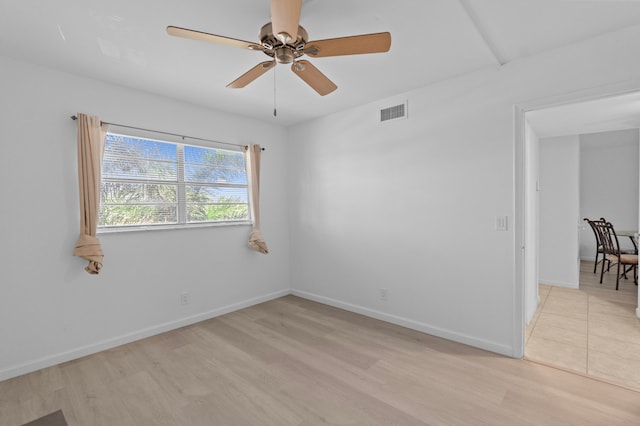 unfurnished room with light hardwood / wood-style floors and ceiling fan