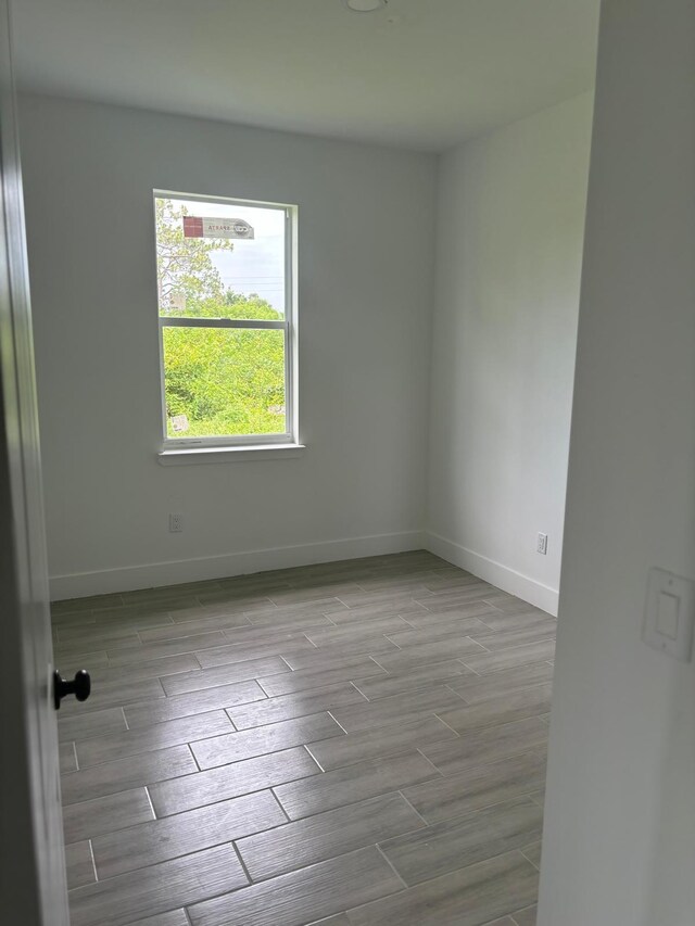 empty room with light wood-type flooring