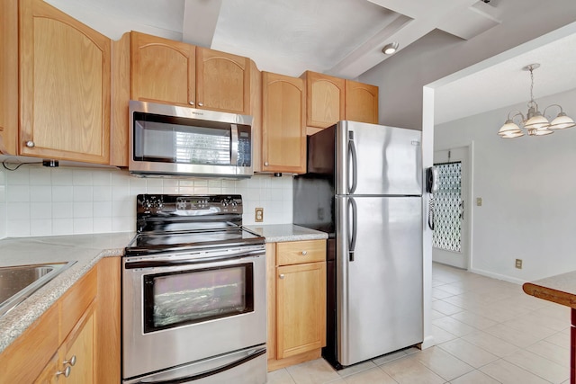 kitchen featuring backsplash, a chandelier, light tile patterned floors, and stainless steel appliances