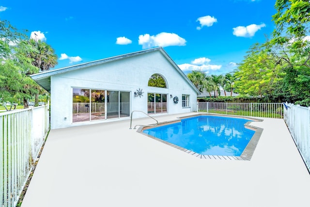 view of pool featuring a patio