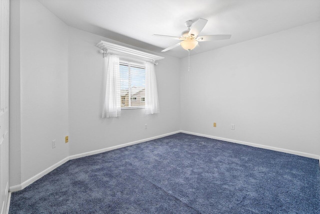 empty room with carpet floors and ceiling fan