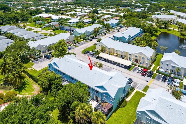 bird's eye view with a water view