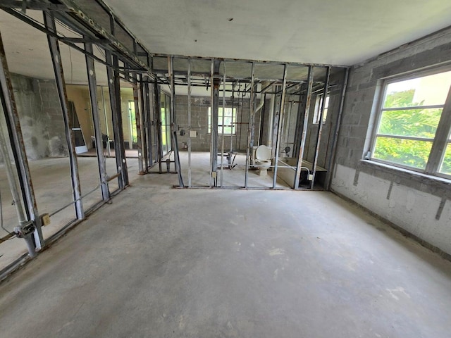 misc room with concrete floors