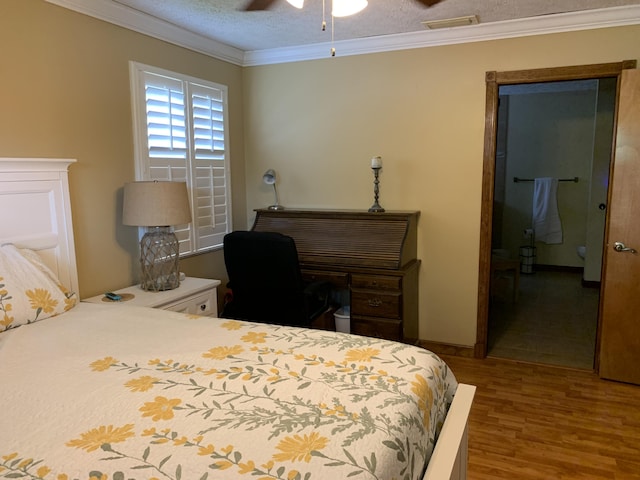 bedroom with hardwood / wood-style flooring, crown molding, a textured ceiling, and ceiling fan