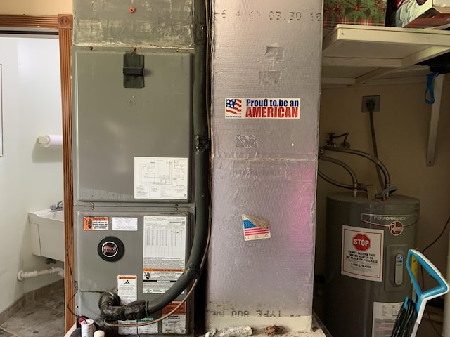 utility room with electric water heater