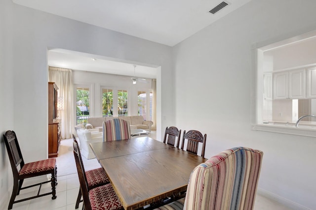 dining space with baseboards and visible vents